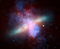 M82_Chandra_HST_Spitzer.webp