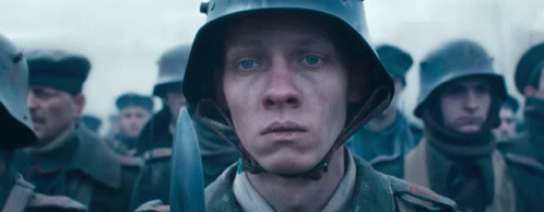 paul-bäumer-looking-broken-as-he-stares-ahead-to-the-battlefield-all-quiet-on-the-western-front.gif