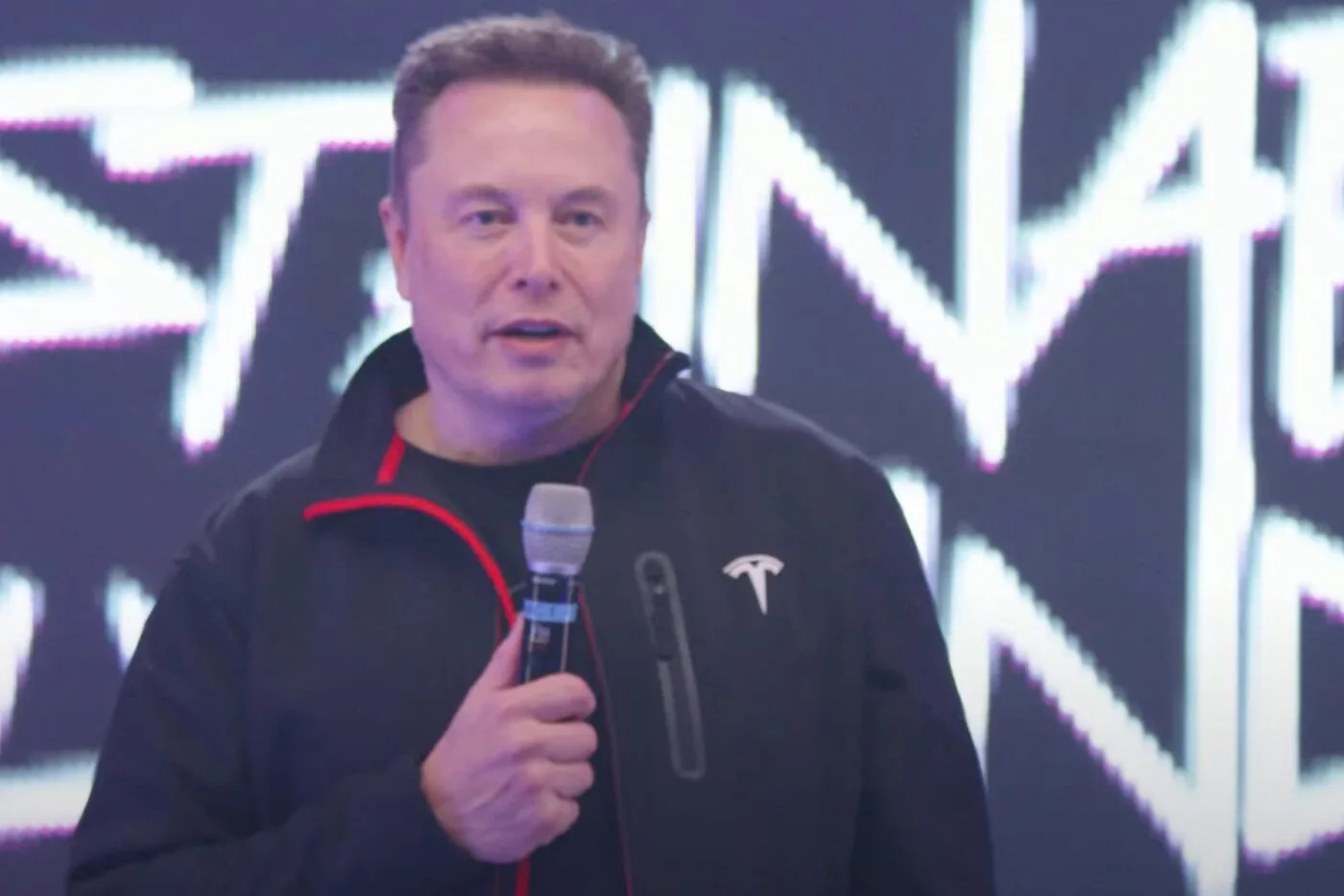 elon-musk-tesla-ceo-shareholder-meeting-2025-1400x933.jpeg.jpg